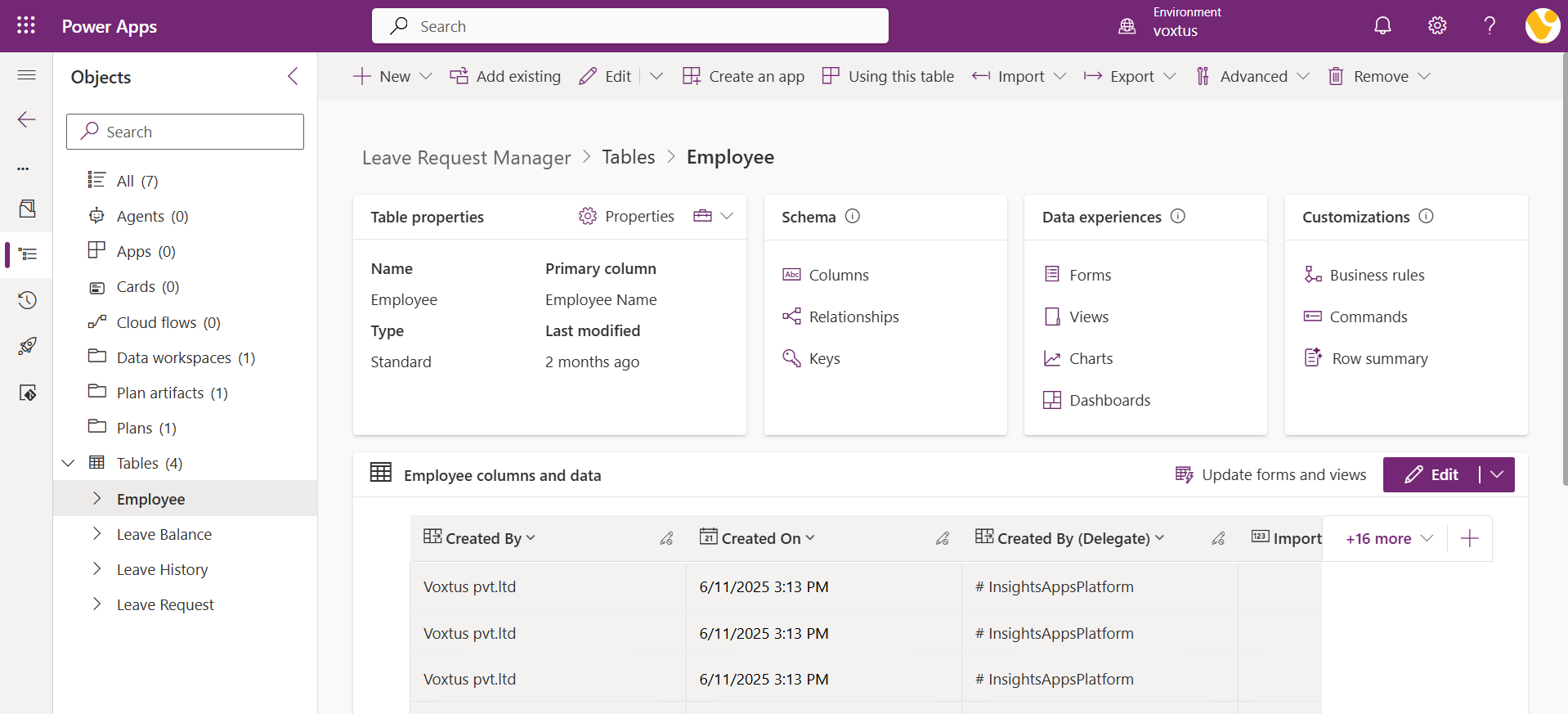 Microsoft Dataverse tables shown on a laptop screen